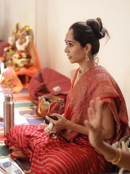 As a nattuvangam artist, I conduct the rhythm for my students using cymbals. This is a crucial part of advanced training and Arangetram preparation.