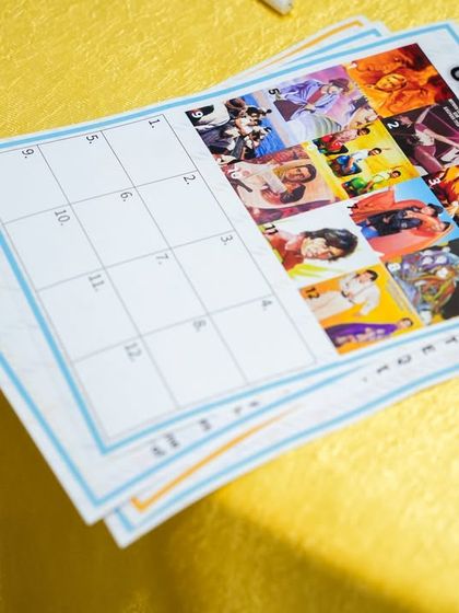 A "Guess the Movie" game card, another fun and interactive table activity for guests.