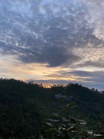 The ever-changing sky over the hills at sunset. Each evening offers a unique canvas, reminding us of the beauty in fleeting moments.
