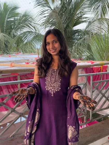 Showing off both palms, ready for the celebrations to begin.
