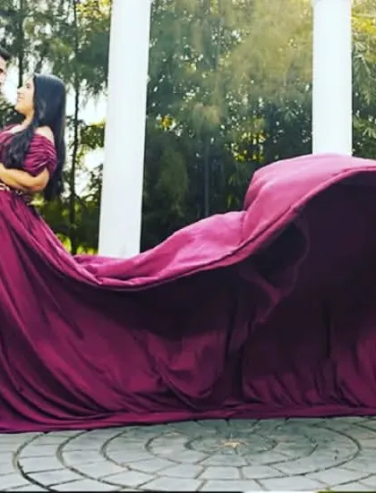 Feel like the main character of your own story with a dramatic trail gown. This client looks absolutely radiant in my Wild Orchid gown, its massive trail creating a powerful and romantic statement for her pre-wedding photos.