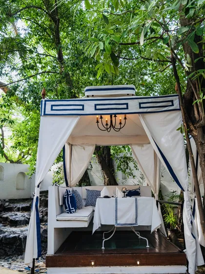 Sevilla is just as beautiful during the day. This daytime view of a cabana shows the crisp, clean lines and Mediterranean-inspired design, perfect for a weekend lunch.