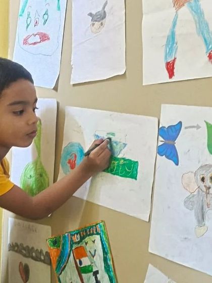 Here is a student carefully adding details to his drawing. It is wonderful to see such focus and dedication.