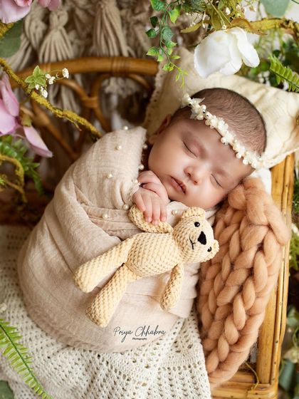 Snuggled up with a tiny teddy bear friend. I have a collection of handmade props like this to add a touch of sweetness to your baby's portraits.