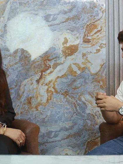 Sharing a laugh during the podcast recording, but the topics we cover, like domestic abuse and legal remedies, are serious. My goal is to make law accessible and less intimidating.