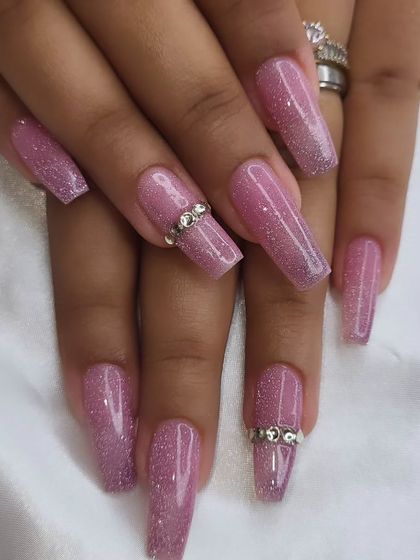 Another angle of the pink glitter nails with rhinestone ring details. Perfect for Christmas, New Year's, or any celebration.