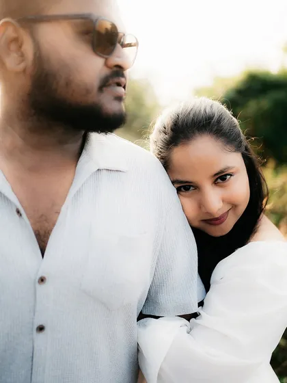 A beautiful close-up portrait showing trust and affection. The soft, golden light enhances the romantic mood.