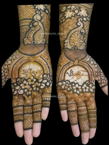 A beautiful way to symbolize a union. This design features love birds on one palm and the couple's initials "VS" with holding hands on the other.