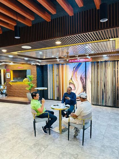 A consultation in progress. Our spacious showroom allows for comfortable and detailed discussions.