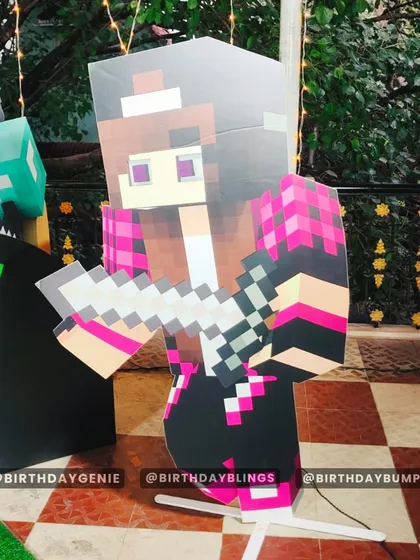 A close-up of a life-sized Alex character cutout from Minecraft, showing the detailed, pixel-perfect design.