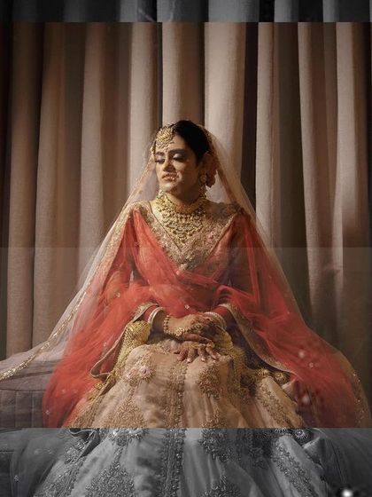 An artistic bridal portrait with a vintage film effect, capturing the bride in a moment of quiet contemplation.