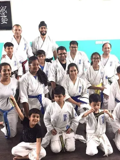 A photo capturing the high spirits of our karateka after a challenging and rewarding training session. The smiles show the joy we find in our practice.