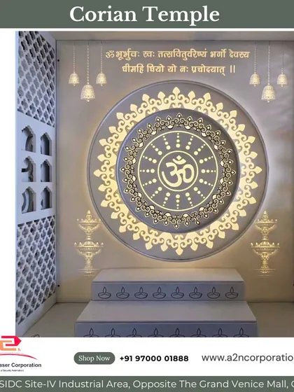 A grand Corian temple design featuring a large, circular backlit panel with the "Om" symbol and Gayatri Mantra. The design is framed by jali-cut side panels and includes tiered steps for placing idols, creating a complete and divine prayer hall.