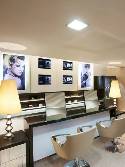 Style meets serenity. The interior of our salon is intricately designed to elevate your mood and provide a rejuvenating escape with its luxurious aesthetics.