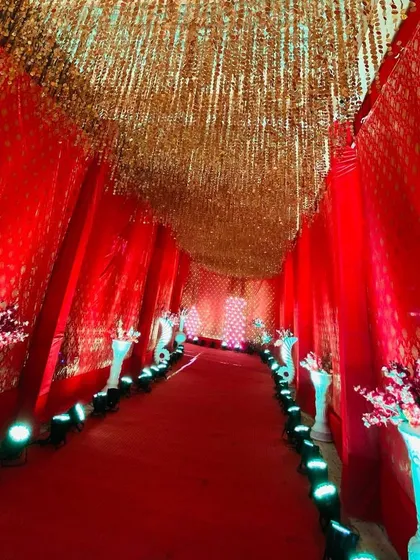 A view from inside the golden string entrance tunnel, showing how it creates a rich and opulent atmosphere.