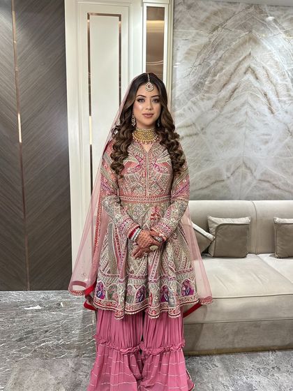 A full-length shot showing how the makeup and hairstyle complete the entire bridal ensemble. I always consider the full look to ensure everything is perfectly balanced.