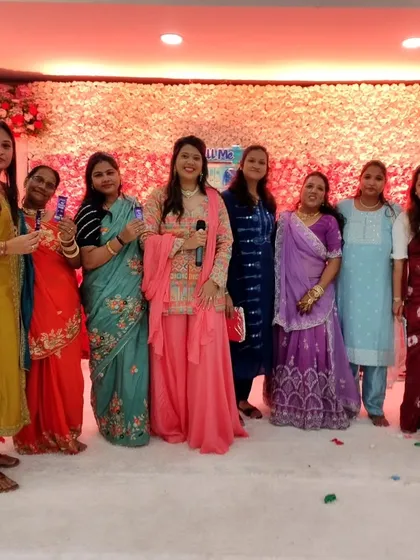 Celebrating with the winners of a game at a baby naming ceremony for my friends. It's always special to host for people you know and to see everyone having a great time.