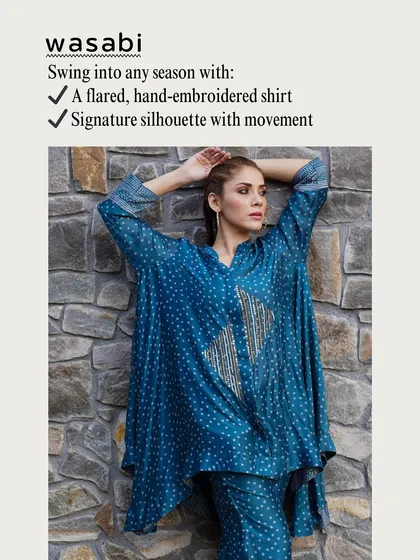 The flared, hand-embroidered shirt is the hero of the Spring Swing set. Its signature silhouette is designed for movement, making it a piece you can swing into any season with.