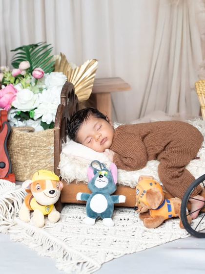 Another angle of the cozy bedroom scene, showing the baby sleeping soundly.