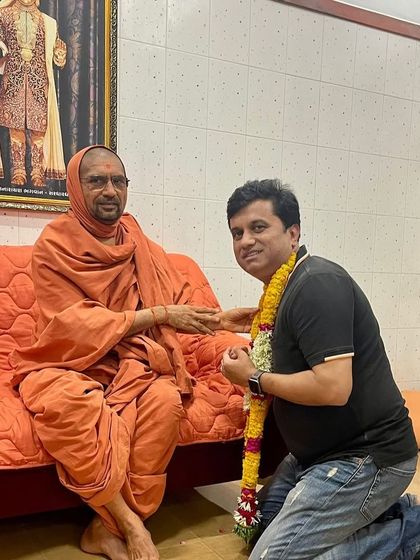 Our founder receiving blessings from a spiritual leader. This connection to a higher purpose is at the heart of our service and healing philosophy.