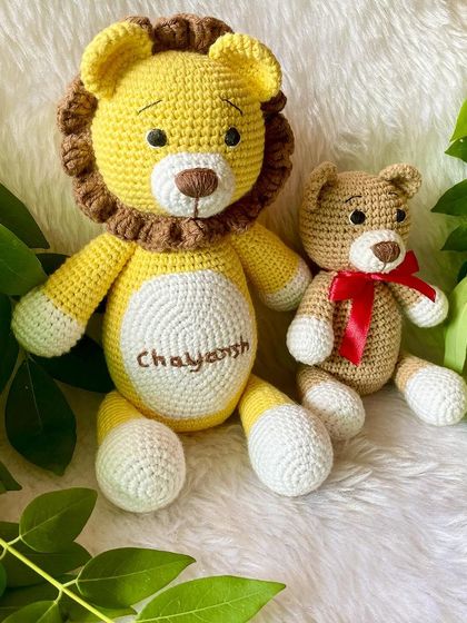 A personalized lion plushie with the name "Chayansh" embroidered on his belly. This sunny yellow lion is ready to be a brave and loyal friend.
