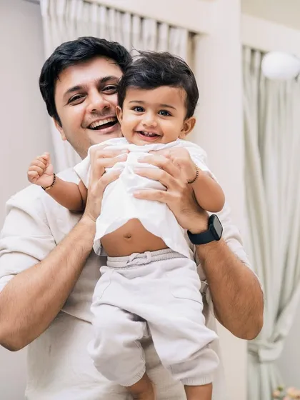 When this little boy grows up, this photo will remind him of how much fun his dad was. Capturing these joyful, candid moments in your home is what makes these sessions so special.