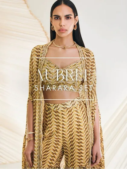 Designed to wow, my Aubree Sharara Set features a printed cape with a hand-embroidered bustier and a flowy, flared sharara for a vibrant and modern ethnic look.