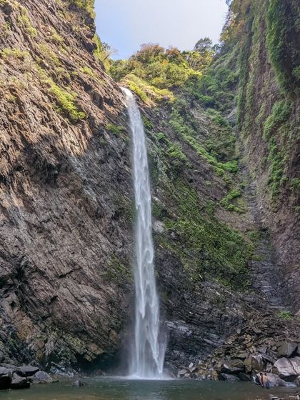 The stunning Koodluthirtha Falls, a tall, slender waterfall plunging into a pool below. We visit this as part of the Narasimha Parvatha trek.