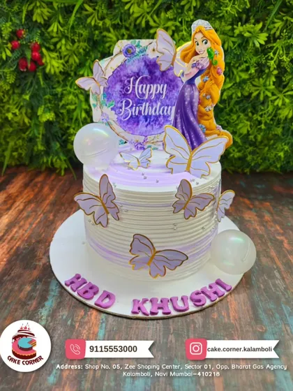 An enchanting princess cake with butterflies and a Rapunzel topper. The purple and white design is perfect for a fairytale-themed birthday.