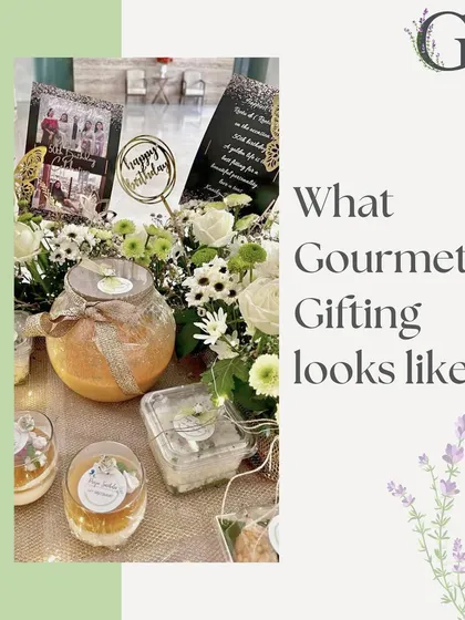 What gourmet gifting looks like. This image shows a personalized birthday hamper with photo cards, flowers, and a variety of our sweet and savory treats.
