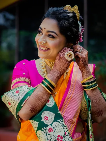 My beautiful bride Sneha, glowing in her traditional Maharashtrian nauvari saree. It was an honor to adorn her hands with mehendi that complemented her timeless look, celebrating a love that brought two countries together.