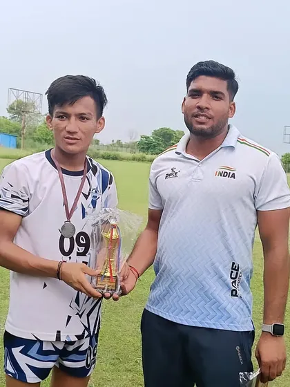 I see my students as my own. Sharing a moment of victory with one of my dedicated athletes after a successful tournament. This is the Guru and student bond that fuels our success.