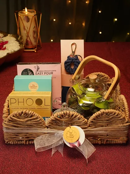 This is more than a gift, it's an experience. My curated festive hamper combines a living terrarium with other artisanal treats, all beautifully arranged in a rustic wicker basket for a truly memorable present.