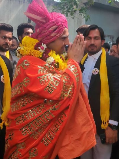 Dressed in traditional attire, accepting the good wishes of my supporters.