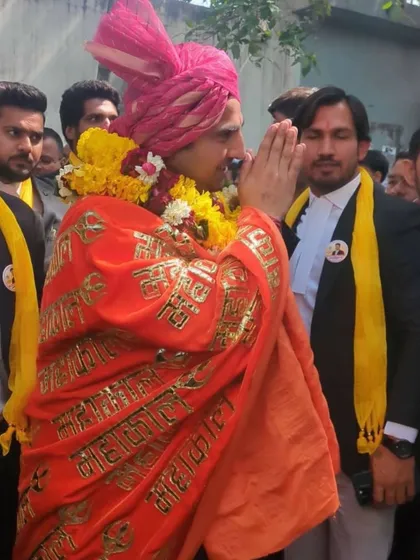Dressed in traditional attire, accepting the good wishes of my supporters.