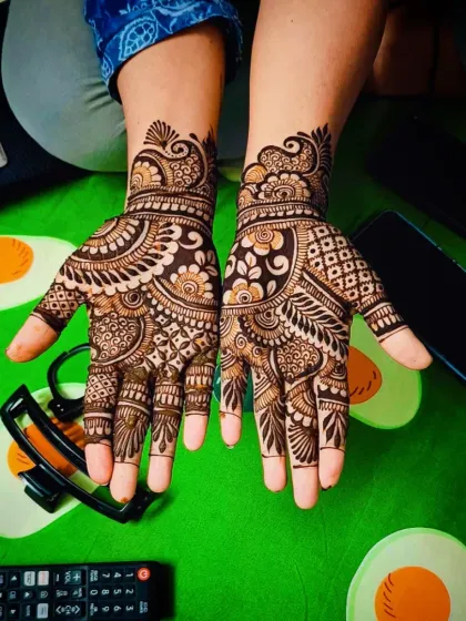 A classic, full-palm traditional design with beautiful shading and detail.