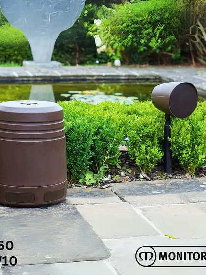 Your audio experience doesn't have to end at your doorstep. We install all-weather outdoor audio systems like this Monitor Audio speaker and in-ground subwoofer, designed to deliver rich, full sound for your garden, patio, or pool area.