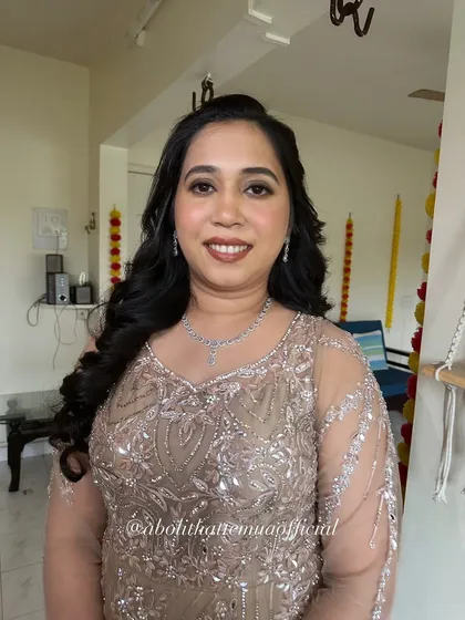 Elegance that never fades. This client wanted a sophisticated look for a party, so I created soft waves and a natural glam makeup look to complement her embellished gown.