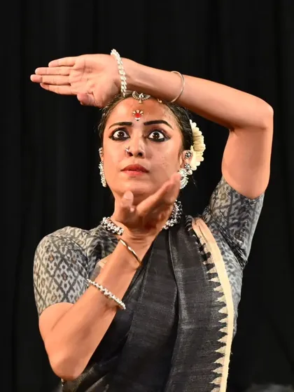 The expressive eyes and hands of an Odissi dancer, captured during the Young Dancers Festival.