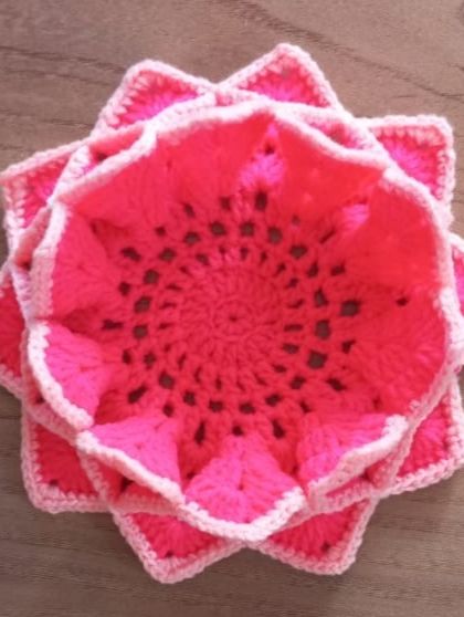 Introducing my lotus flower shaped coasters in a lovely bright pink with a lighter pink edge. The design is simple, yet elegant.