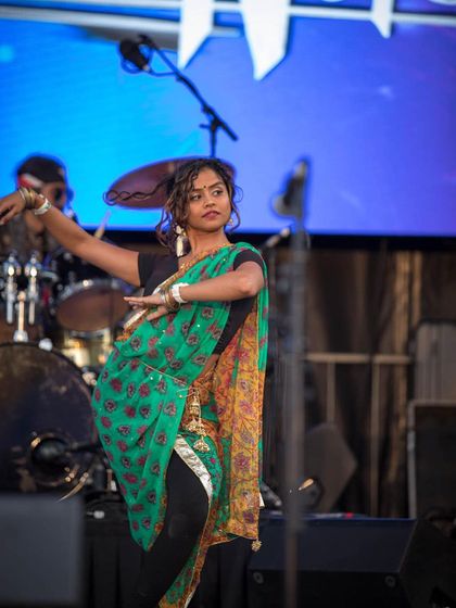 A beautiful shot of a dancer from the Rolex Rasathy performance at Basement Bhangra Bacchanal. My events showcase a wide range of talent, including singers, musicians, and professional dance troupes.