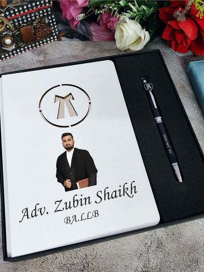 For the advocate in your life, this personalized diary and pen combo is a perfect gift. The diary features the lawyer's emblem and can be customized with their name, photo, and title.