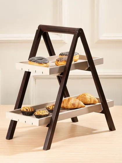 A two-tiered, A-frame serving stand elegantly displaying a selection of pastries.