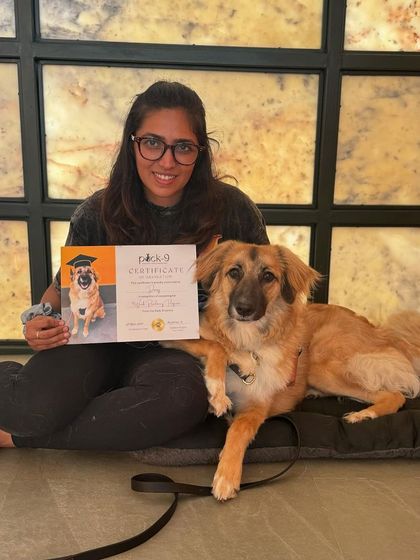 Daisy, the first graduate from our new facility, looking regal with her certificate.