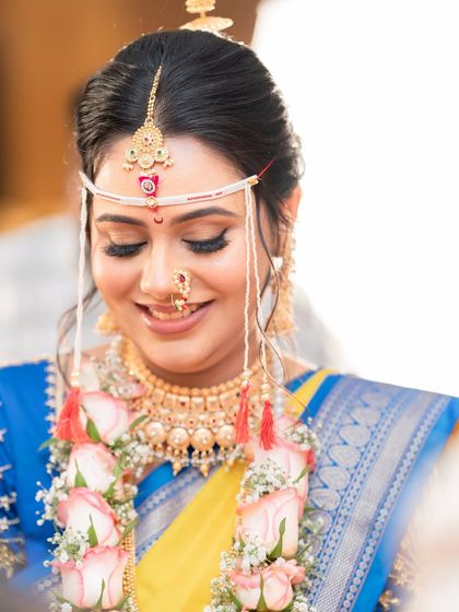 A close-up of the bride during the ceremony, her eyes shining with happiness.