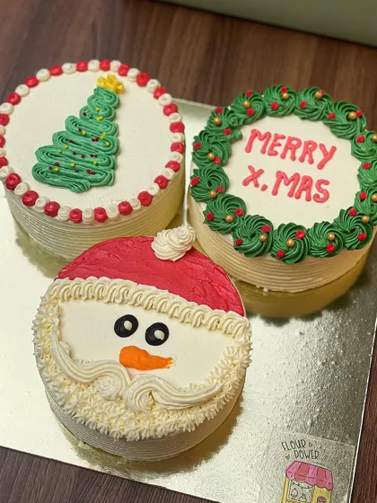Another look at my set of three Christmas bento cakes, featuring Santa, a wreath, and a Christmas tree design.