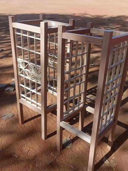 A pair of completed Kumiko lamps, made from beechwood and white ash, resting after a lot of hard work in the workshop. They are ready to go to their new homes.