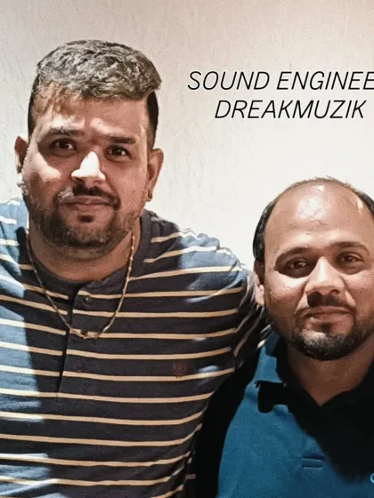 With my sound engineer. Having a professional tech team is crucial for delivering high quality audio at every event.
