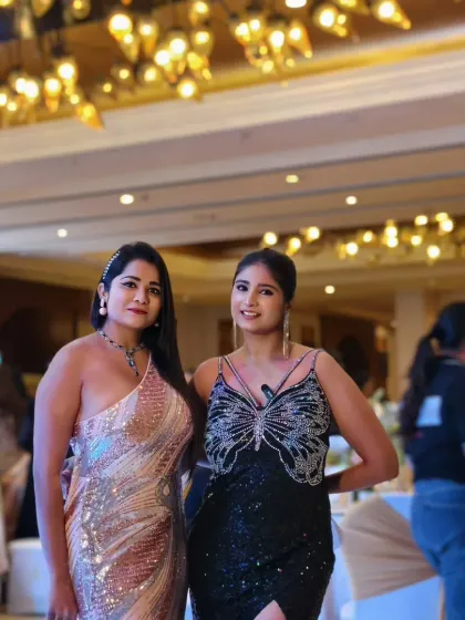 A moment with my co-host during the anniversary celebration. Teamwork makes the dream work, especially when hosting a grand event at a venue like ITC Maurya.