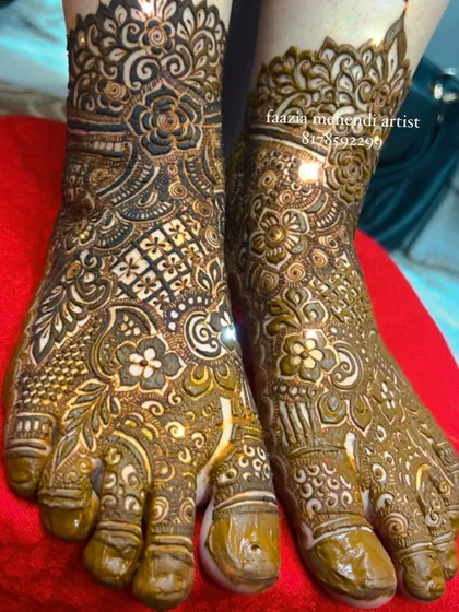 A close-up of a bridal feet design with a mix of bold and fine lines. The detail work is what makes it special.